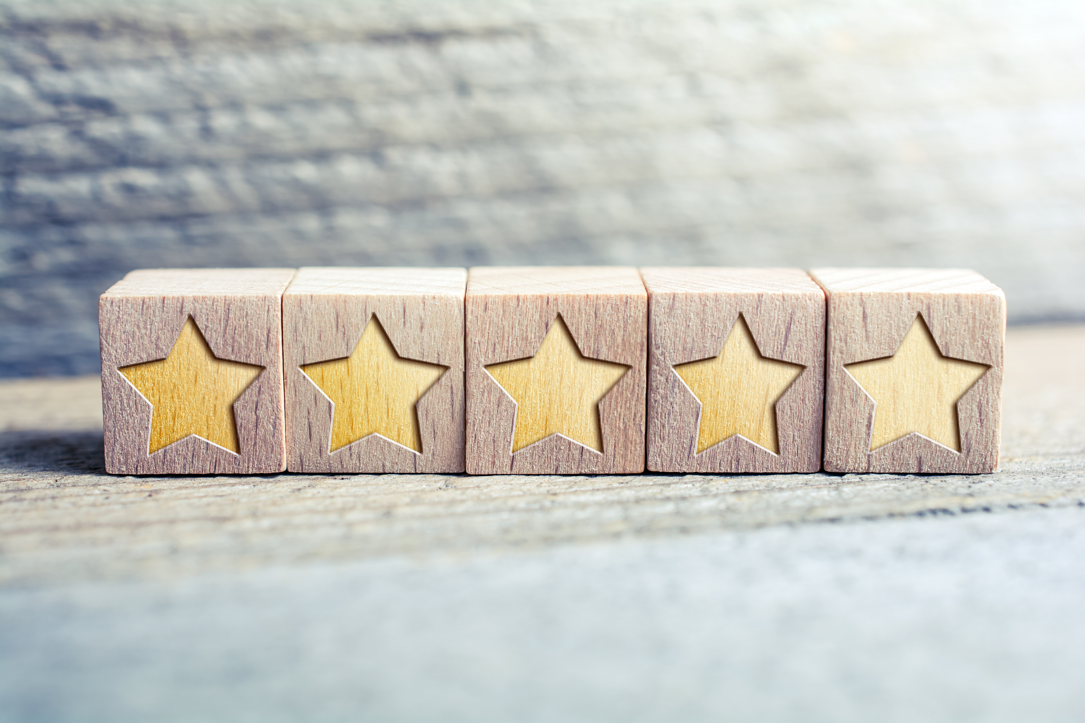 5 Star Ranking Formed by Wooden Blocks on a Board 