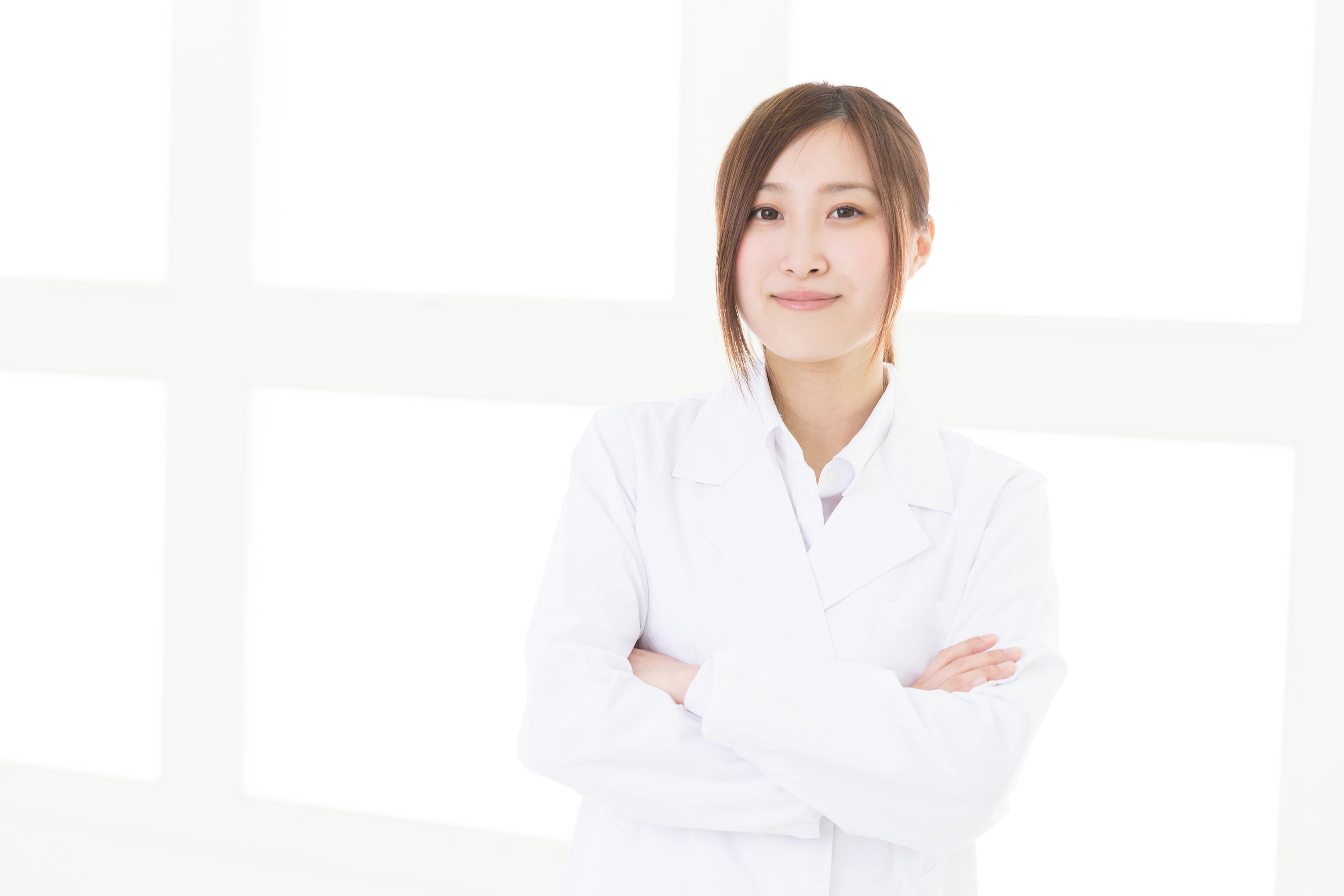 Woman wearing a lab coat